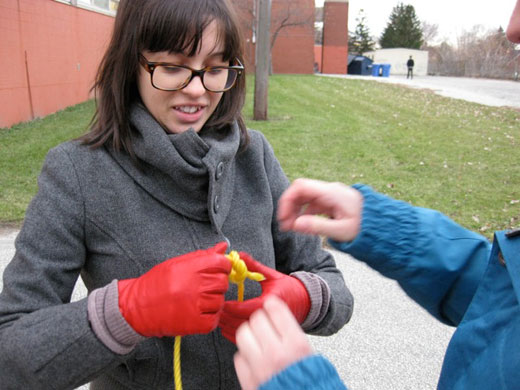 Danielle and Michelle work out the knotting system