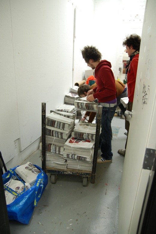 Stacking more newspapers in my studio