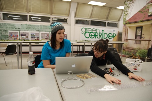 Michelle and Danielle study the vague wiring example we had