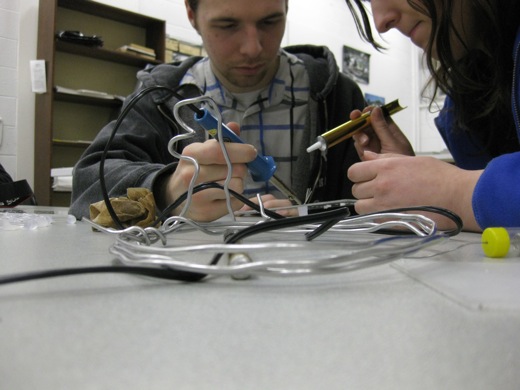 Josh and Michelle try to clean up some of the solder