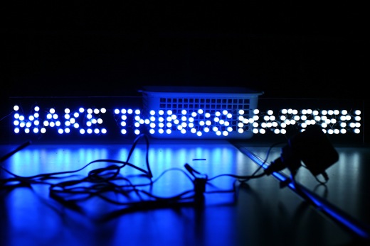 MAKE THINGS HAPPEN, the sign lit up