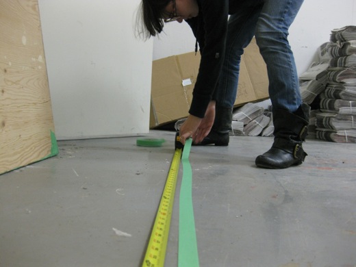 Danielle measured out the size of an EC Row fence section