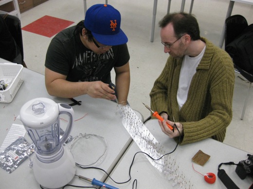 Mike and Darren soldering