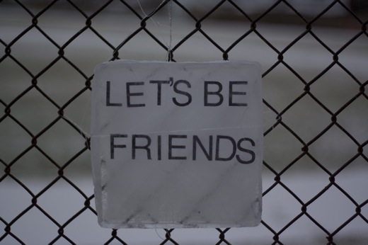 Let's Be Friends, installed on a fence in Windsor, Ontario