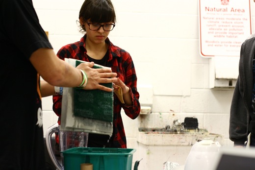 the process of draining water from paper