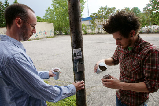 Darren and Justin filling planters with soil