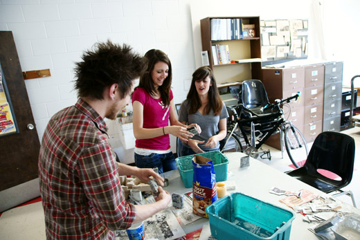 Justin, Ethina, Rosina repairing planters