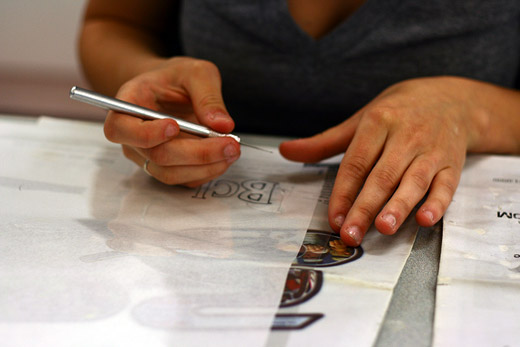 Rosina cuts a stencil