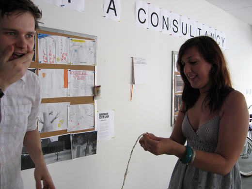 Steven and Michelle braiding a plastic bag