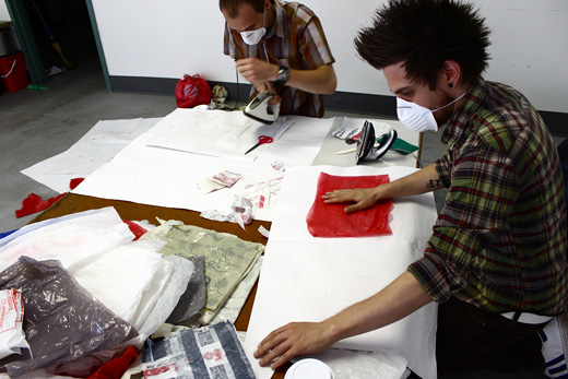 Justin attempting to iron a zellers bag