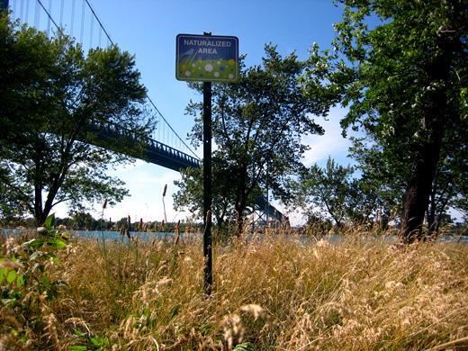 sign at the riverfront
