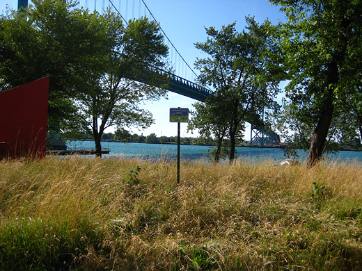 sign at the riverfront