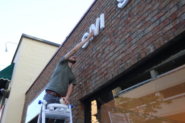 Installing some signage on the exterior wall of CIVIC SPACE (2)