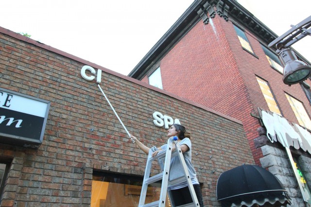 Installing some signage on the exterior wall of CIVIC SPACE (6)