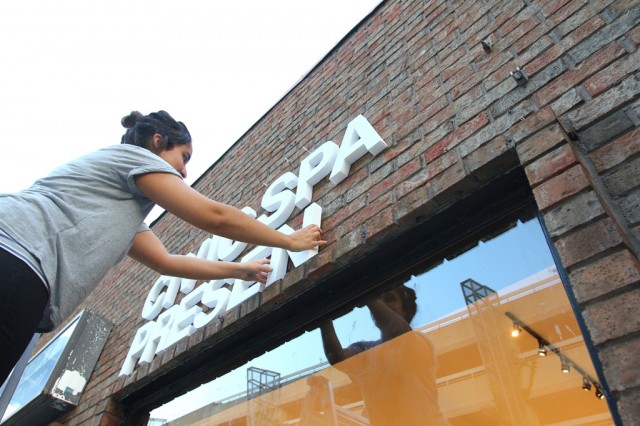 Installing some signage on the exterior wall of CIVIC SPACE (5)
