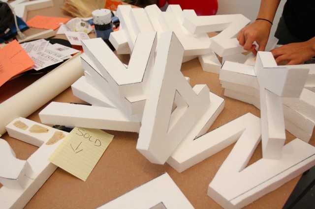 Styrofoam letters, white walls, night time guerilla art (9)